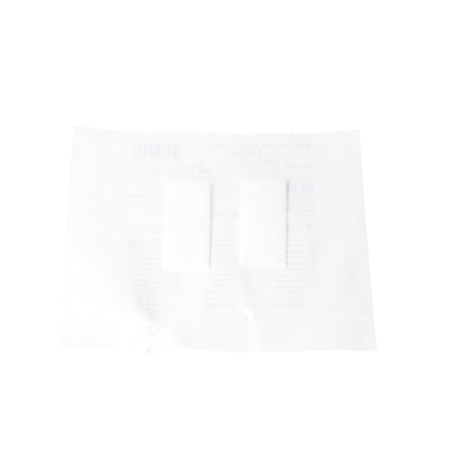 Weiße Verpackung in der zwei kleine Filter erkennbar sind.